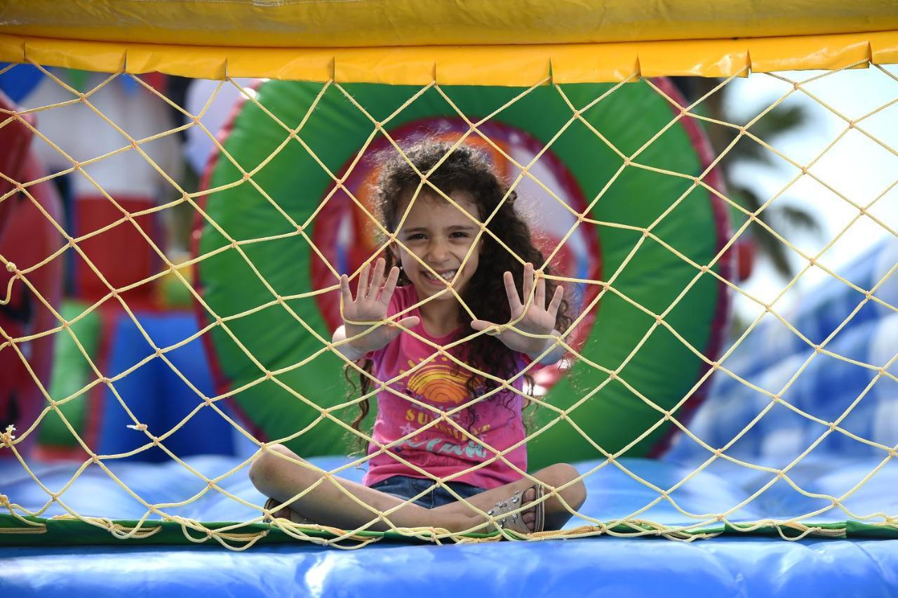 Sealine Beach, A Murwab Resort Musajid Zewnętrze zdjęcie A child playing at the Children's Museum of Oak Ridge
