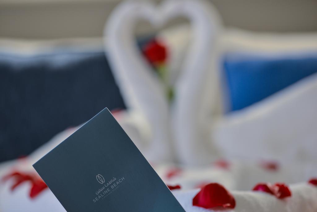 Sealine Beach, A Murwab Resort Musajid Zewnętrze zdjęcie A menu at the Waldorf Astoria Ras Al Khaimah
